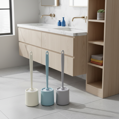 Cream, light blue, and light gray toilet brushes organized beside a bathroom vanity